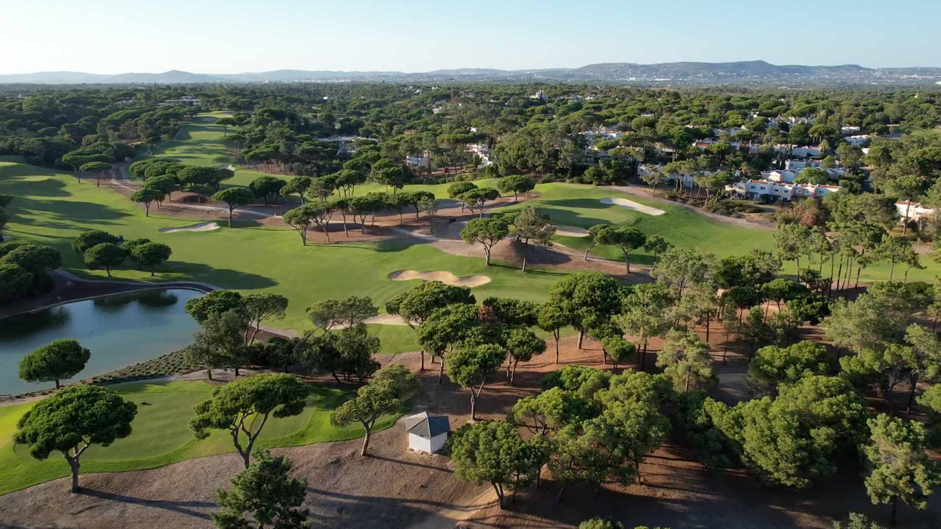 an overhead drone shot of quinta do lago golf course in the algarve