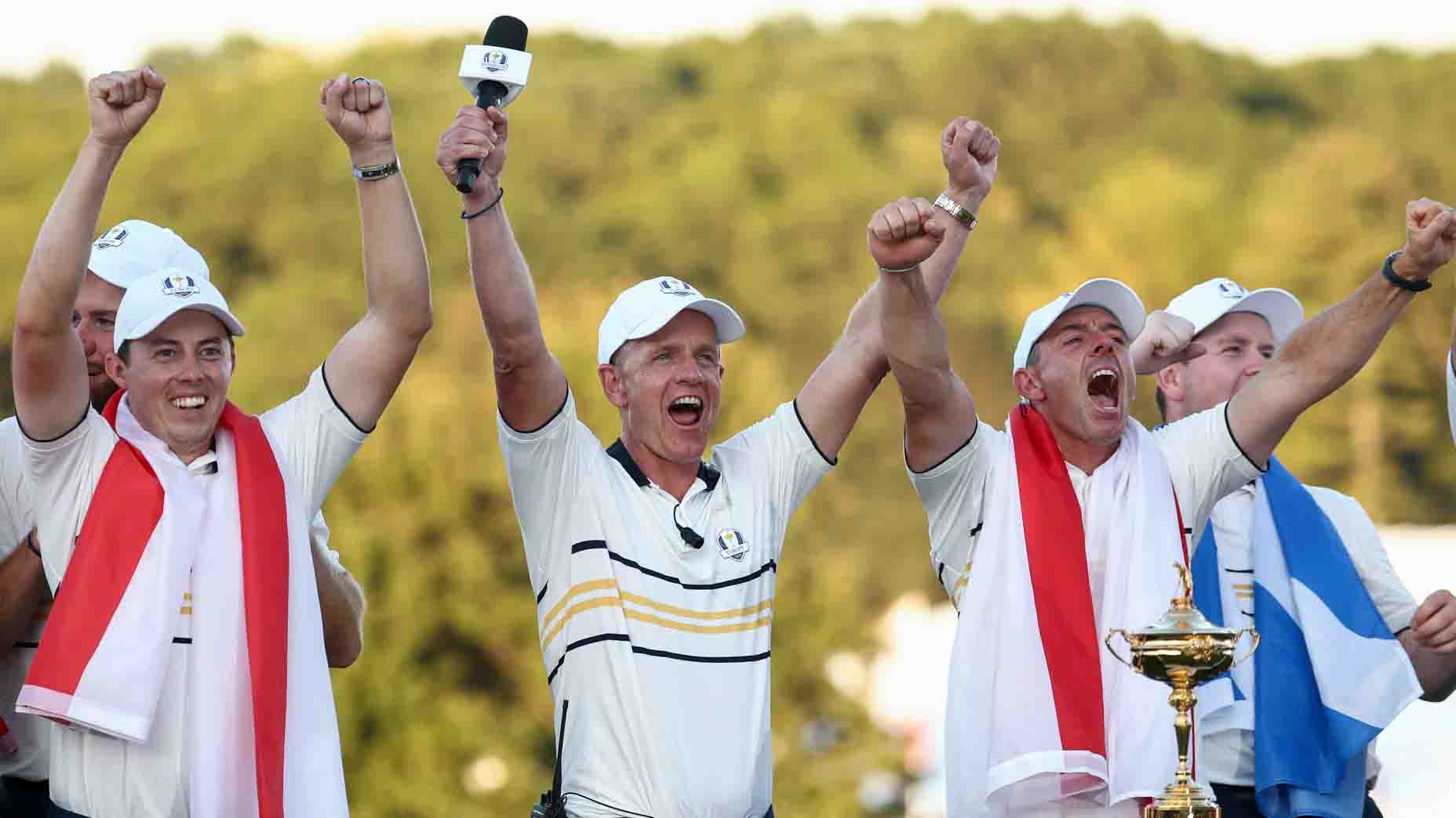 Luke Donald, Rory McIlroy and Matt Fitzpatrick celebrate Europe's Ryder Cup win at Bethpage Black