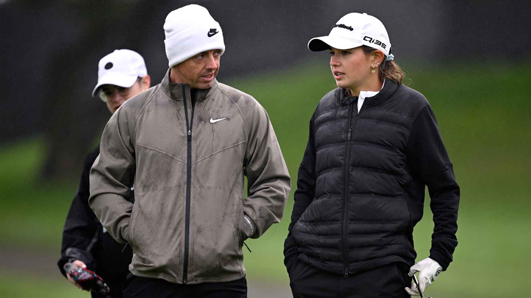 Kai Trump talks with Rory McIlroy