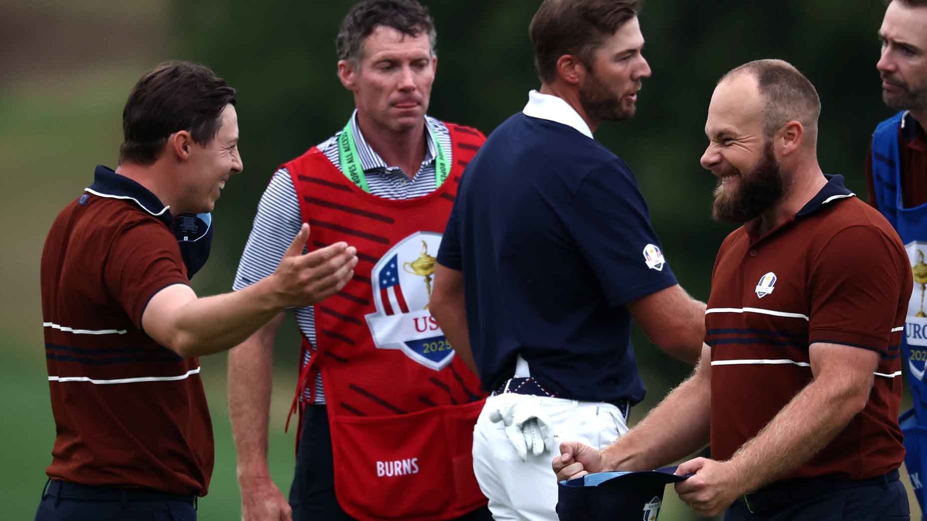 Tyrrell Hatton and Matt Fitzpatrick celebrate winning their four-ball match during the Ryder Cup