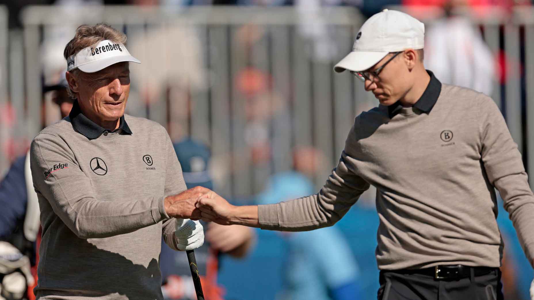 Bernhard Langer of Germany and his son Jason Langer react on the first tee during the second round of the PNC Championship at Ritz-Carlton Golf Club on December 22, 2024 in Orlando, Florida. (Photo by Douglas P. DeFelice/Getty Images)