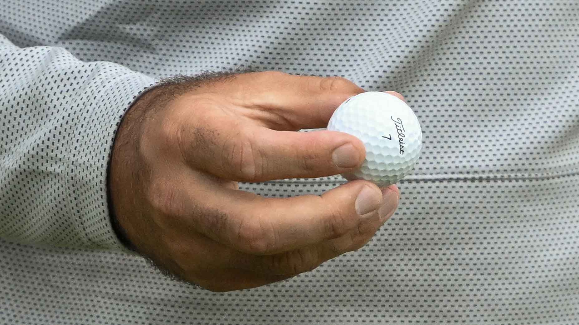 A detailed view as Scottie Scheffler of The United States holds his ball on day two of The 153rd Open Championship at Royal Portrush Golf Club on July 18, 2025 in Portrush, Northern Ireland.