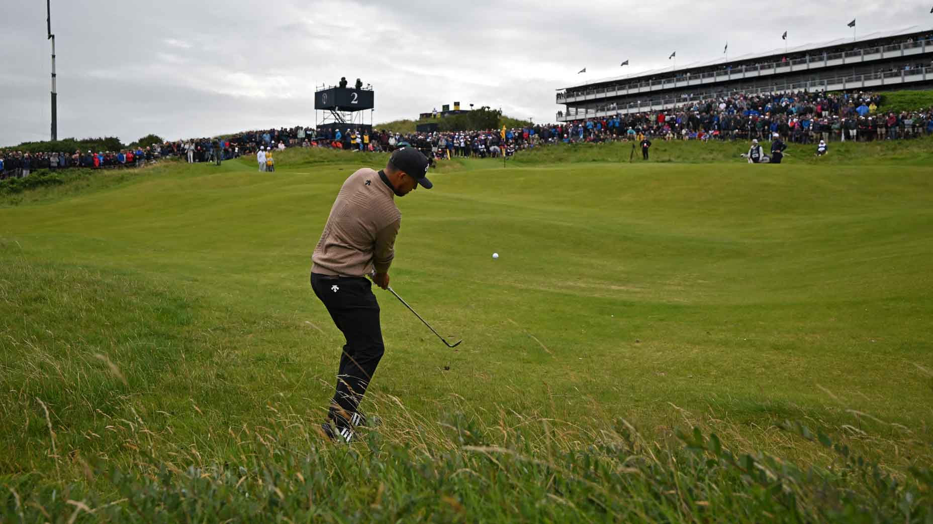 US golfer Xander Schauffele chips onto the 2nd green on the opening day of the 153rd Open Championship at Royal Portrush golf club in Northern Ireland on July 17, 2025. (Photo by ANDY BUCHANAN / AFP) / RESTRICTED TO EDITORIAL USE (Photo by ANDY BUCHANAN/AFP via Getty Images)