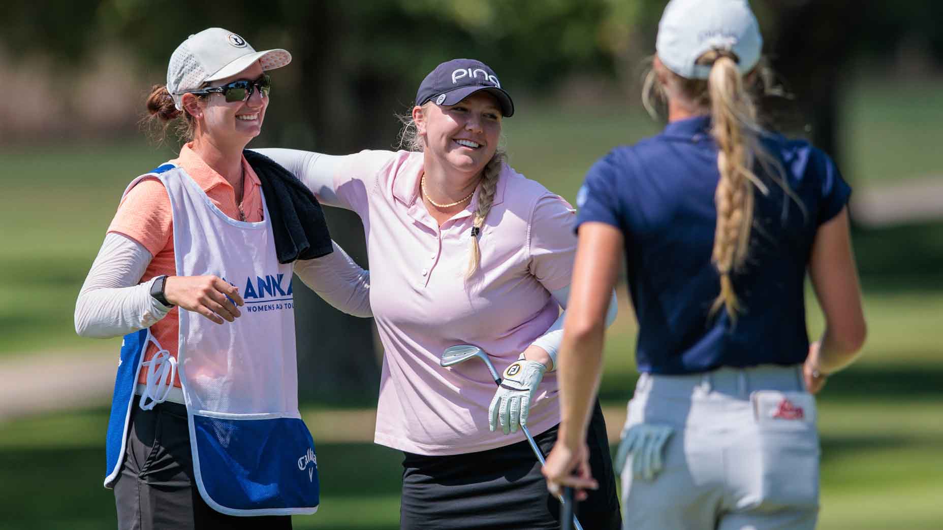 Hailee Cooper celebrates on the eighteenth green after the final round of the ANNIKA Women's All Pro Tour: Heritage Classic at Rolling Hills Country Club on August 4, 2024 in Wichita, Kansas.