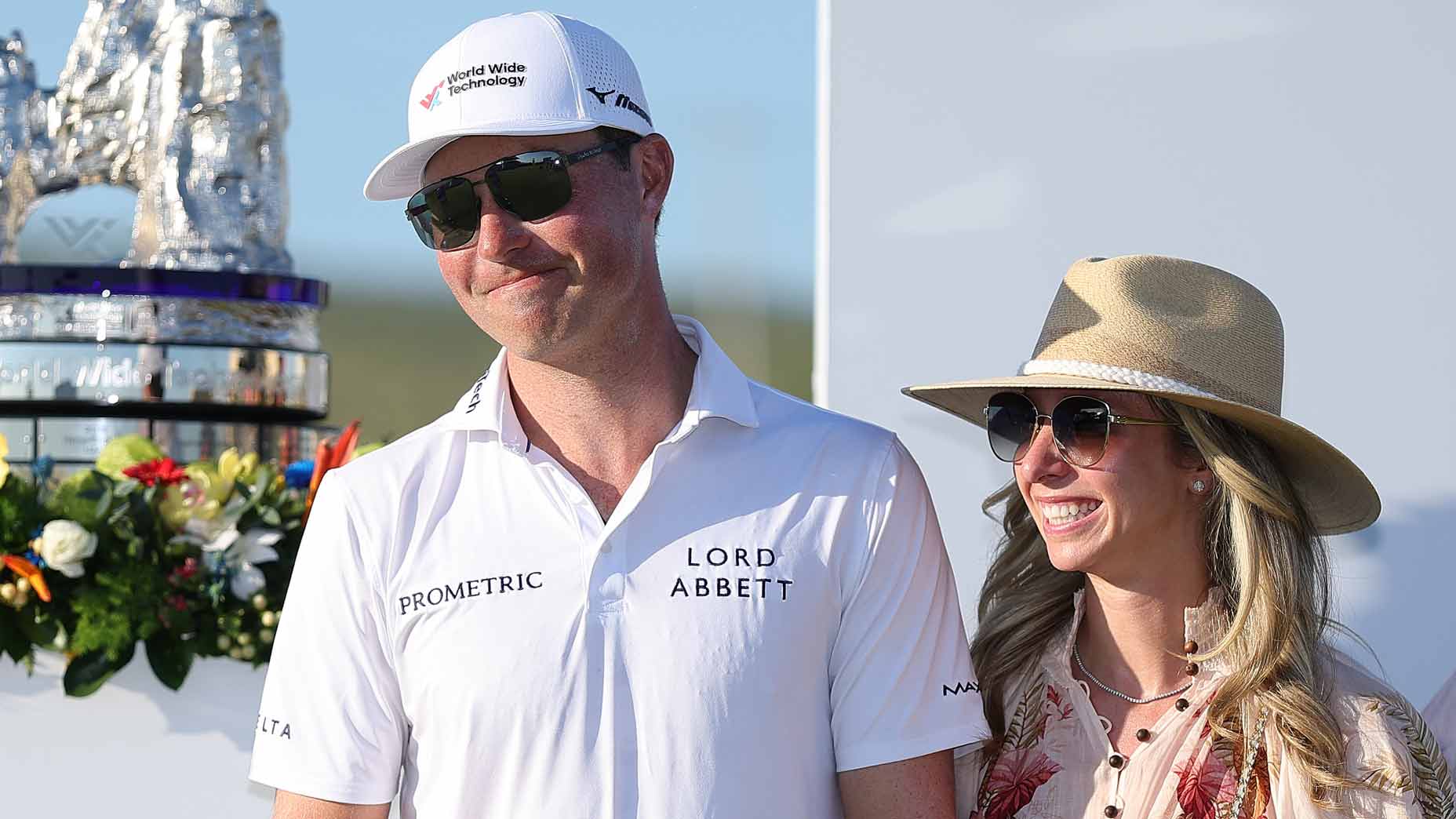 Ben Griffin celebrates with wife Dana Myeroff after winning 2025 World Wide Technology Championship at Tiger Woods course.