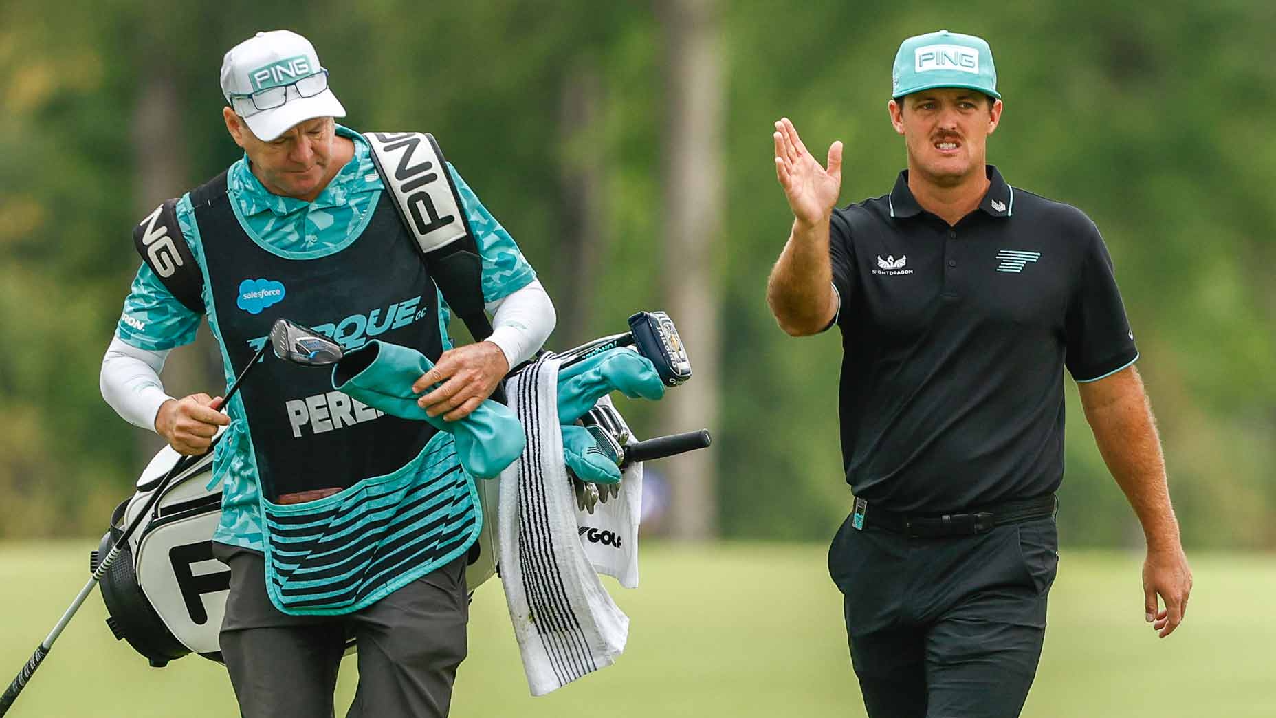 LIV pro Mito Pereira walks with caddie during 2025 LIV Michigan event.