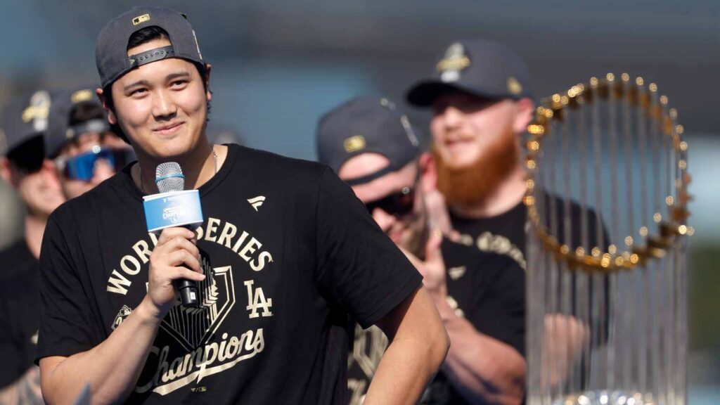 Shohei Ohtani, pictured after winning 2025 World Series, matched a Tiger Woods record.